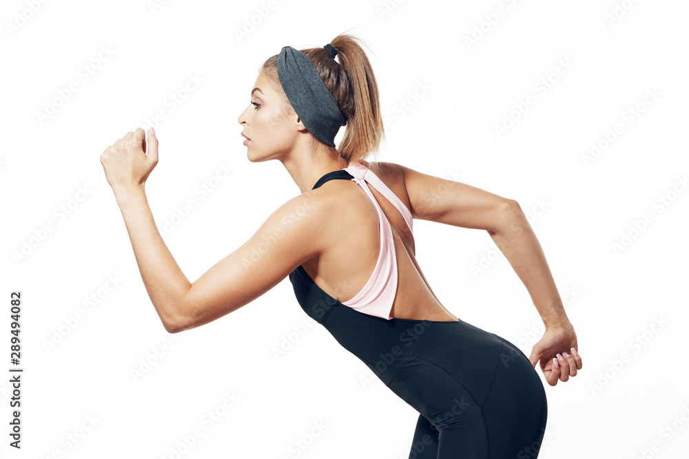 young woman with dumbbells