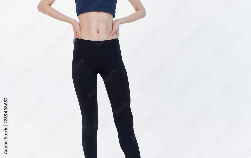 young woman doing fitness exercise young woman doing fitness exercise