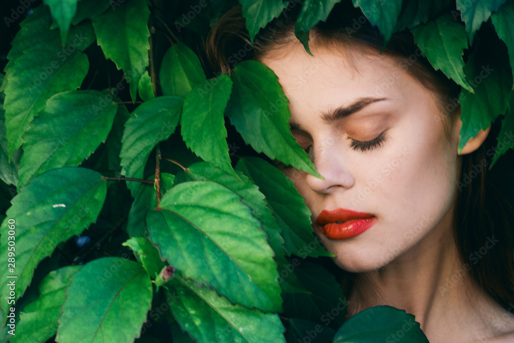 Beautiful woman green leaves park Beautiful woman green leaves park