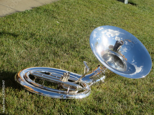 A polished tuba at rest before a Marching Band Contest.