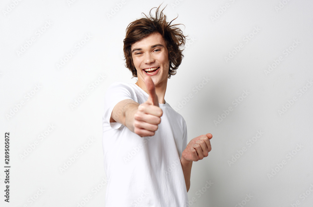 young woman showing ok sign young woman showing ok sign