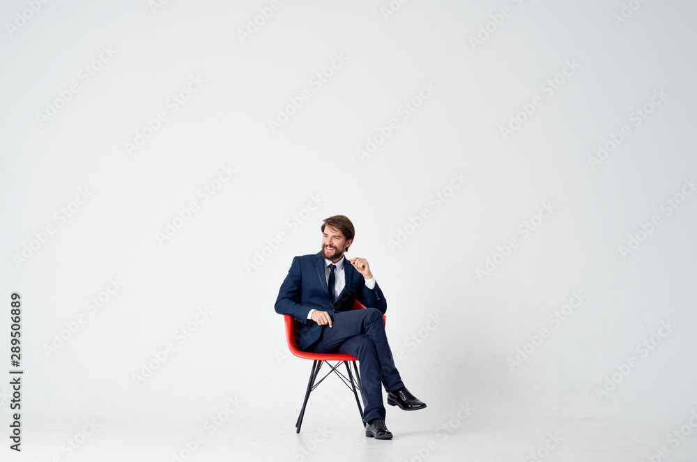 businessman sitting on office chair - obrazy, fototapety, plakaty 