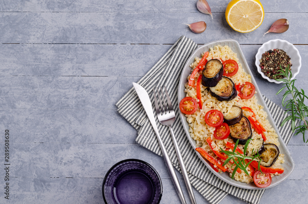 Bulgur with slices of fried vegetables