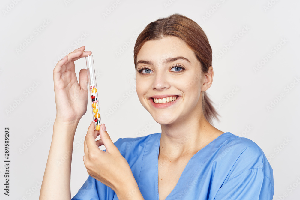 smiling woman with bottle of medicine smiling woman with bottle of medicine