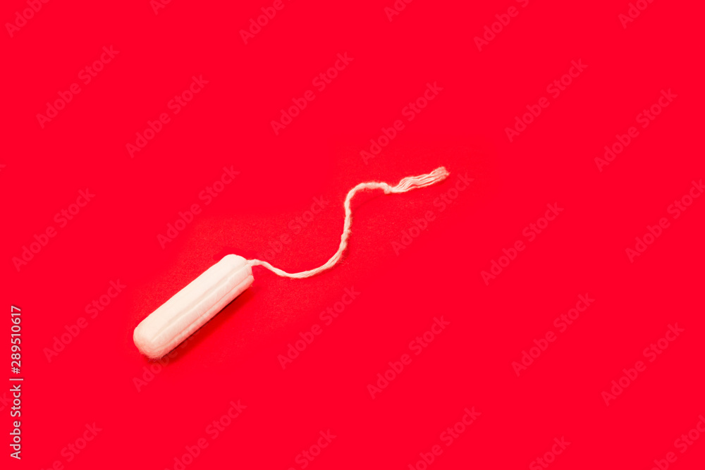 hygienic tampons on a red background, womens health hygienic tampons on a red background, womens health