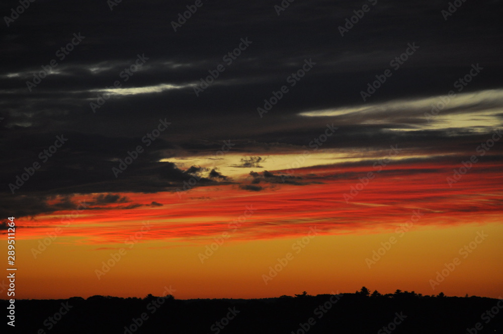 Bands of Awesome Sky Color in Sunset Horizon Cloud Bank