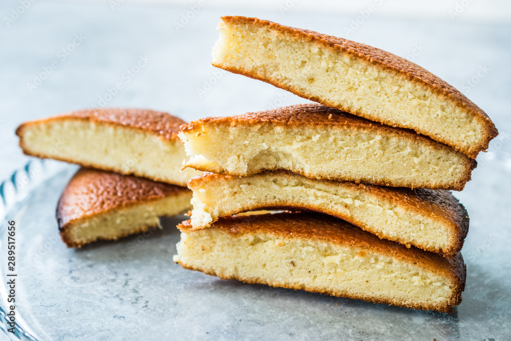 Sponge Cake Slices in Glass Tray. Ready to Serve. Sponge Cake Slices in Glass Tray. Ready to Serve.
