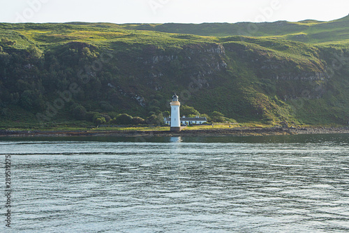 Lighthouse in Tobermory coastline Isle of Mull Scotland © Lucie