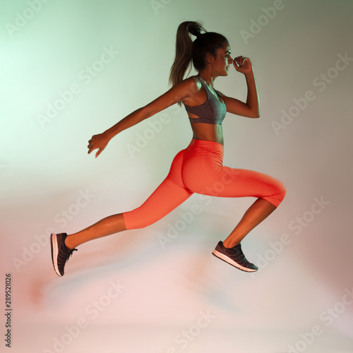 Side view of athlete running