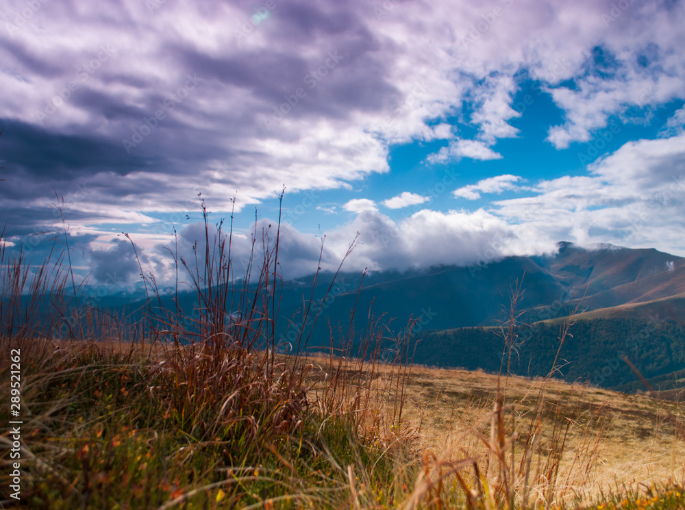 Mountain landscape with mist and clouds, summer Mountain landscape with mist and clouds, summer