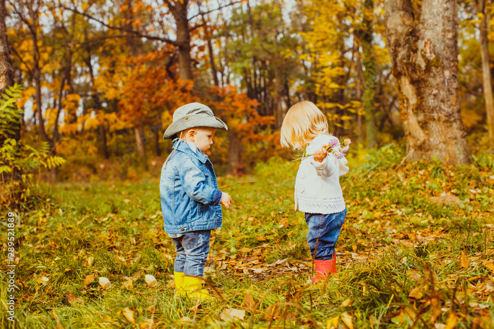 Two little boys standing in front of each other Two little boys standing in front of each other