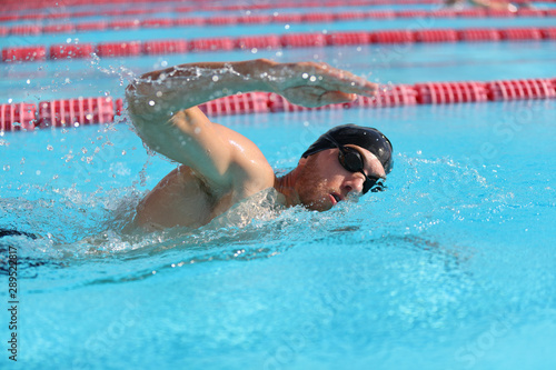 Swim triathlon competition training man athlete swimmer in outdoor lane swimming . Sport and fitness active athletes.