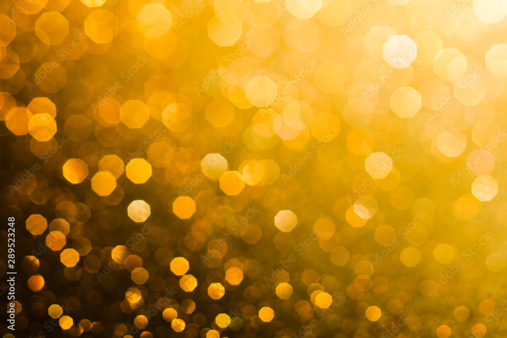 Gold abstract bokeh background for sparkle design Gold abstract bokeh background for sparkle design
