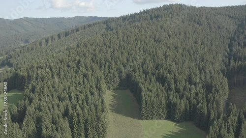 aerial view over mountains in Velke karlovice beskydy czech, This clip is available in two different gradings , 10bit color or dji color lut  photo