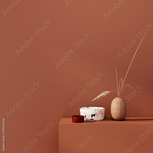 Interior decoration with vases  on a background of a teracotta wall photo