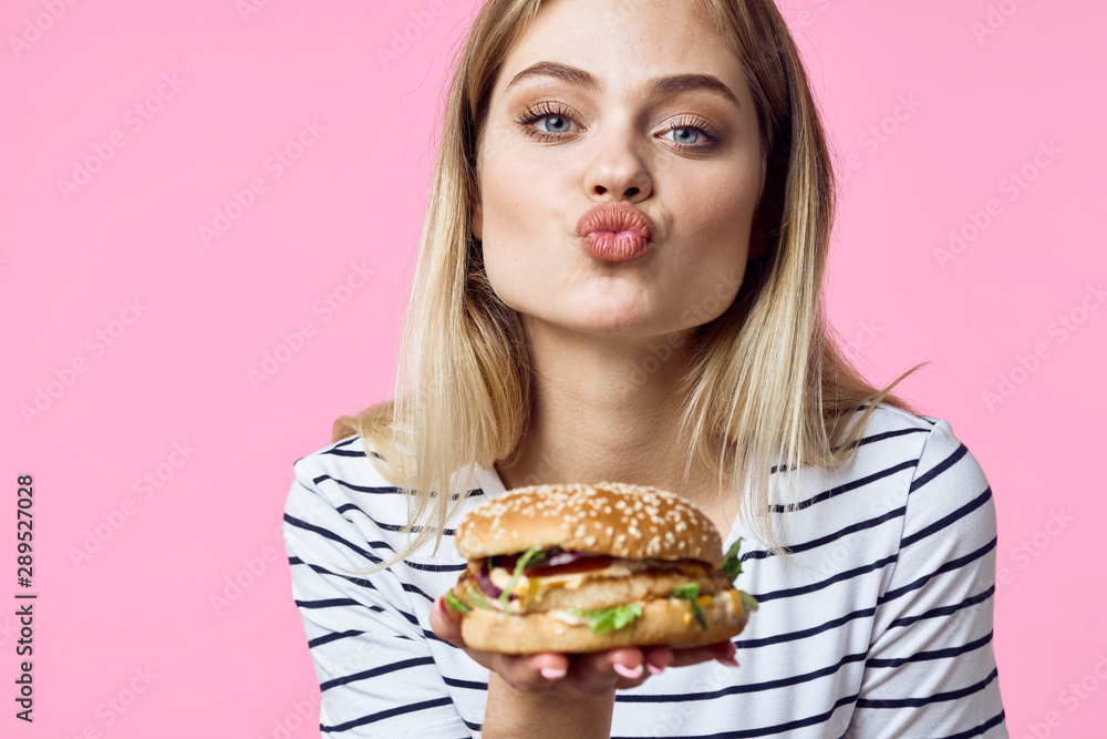 woman with hamburger