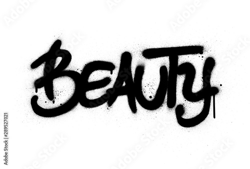 graffiti beauty word sprayed in black over white