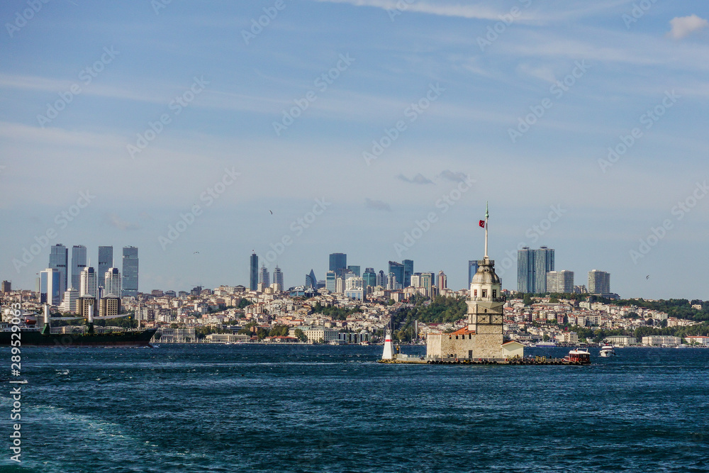Maiden Tower and modern Istanbul buildings