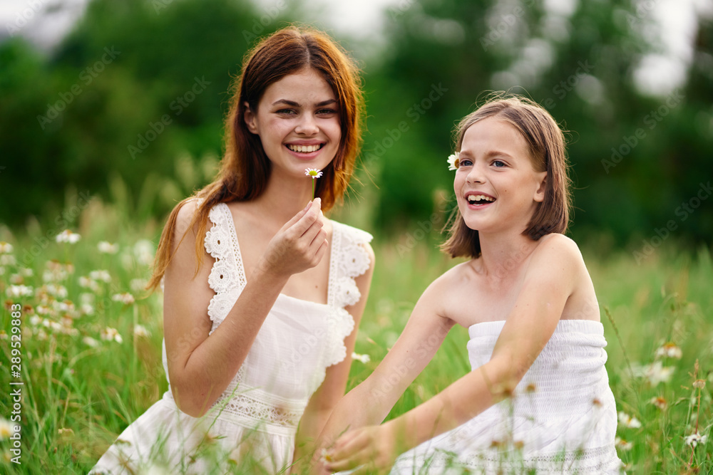 mother and daughter in the park mother and daughter in the park