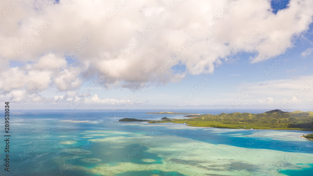 Fototapeta premium Bucas Grande Island, Philippines. Beautiful lagoons with atolls and islands, view from above. Seascape, nature of the Philippines.