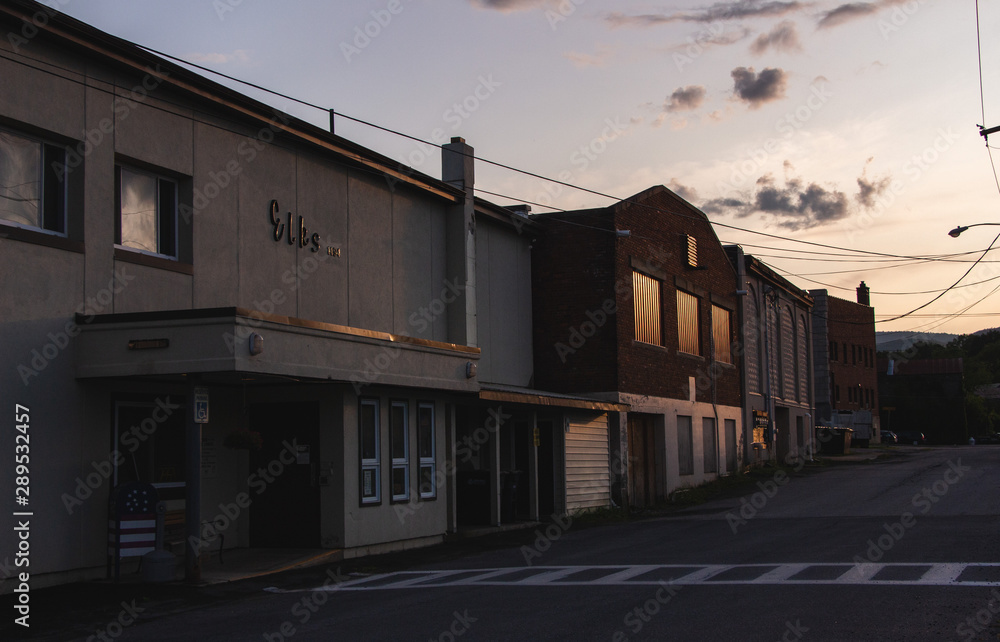 Buildings reflecting light at golden hour