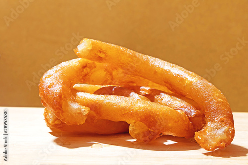 Jalebi an Indian sweet made by deep frying flour and dipping it in the sweet sugar syrup photo