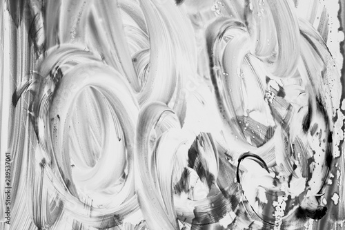 Abstract gouache paint strokes in black and white painting for backgrounds