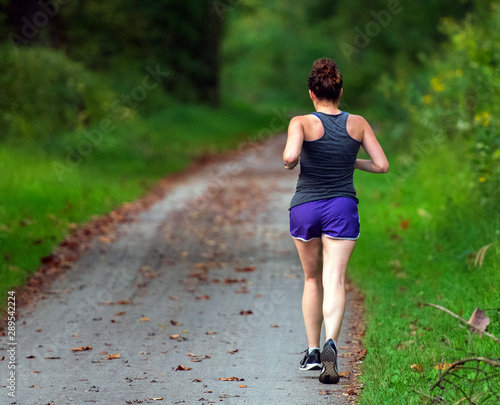 Fotografie Female Runner on the Towpath Trail