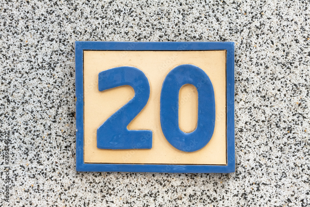 Number 20, twenty, street number sign on the wall Number 20, twenty, street number sign on the wall