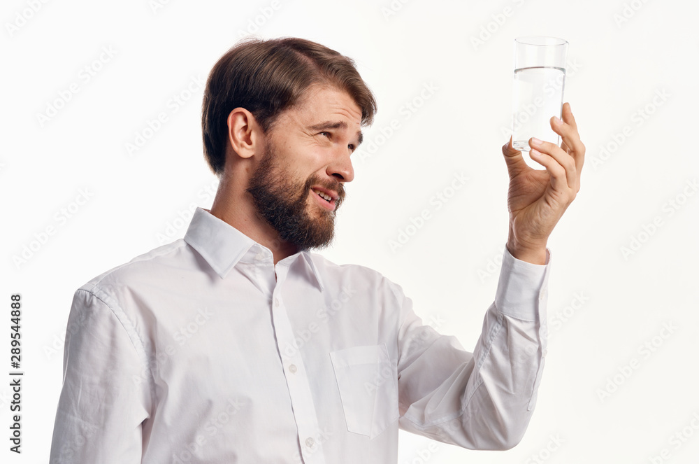 portrait of young man with magnifying glass of red wine portrait of young man with magnifying glass of red wine