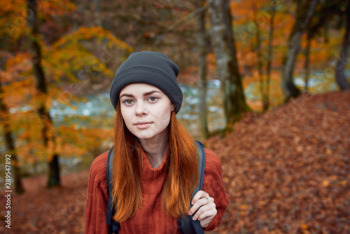 young woman in autumn park