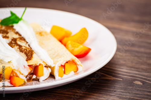 Sweet crepes with apricots