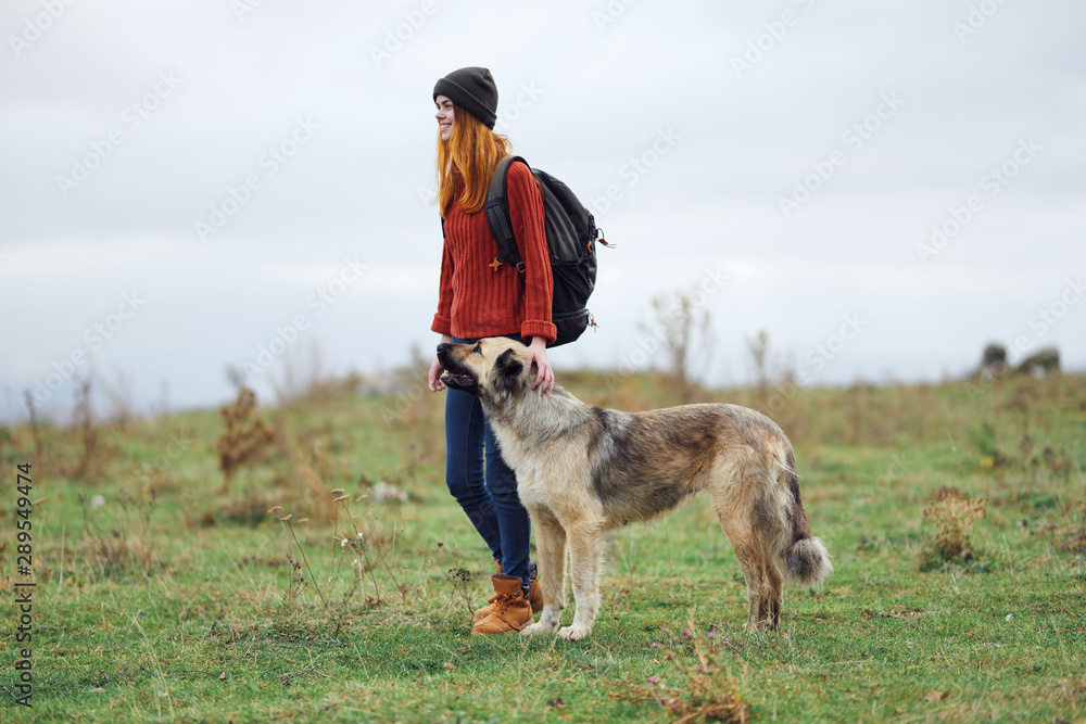 young woman and his dog