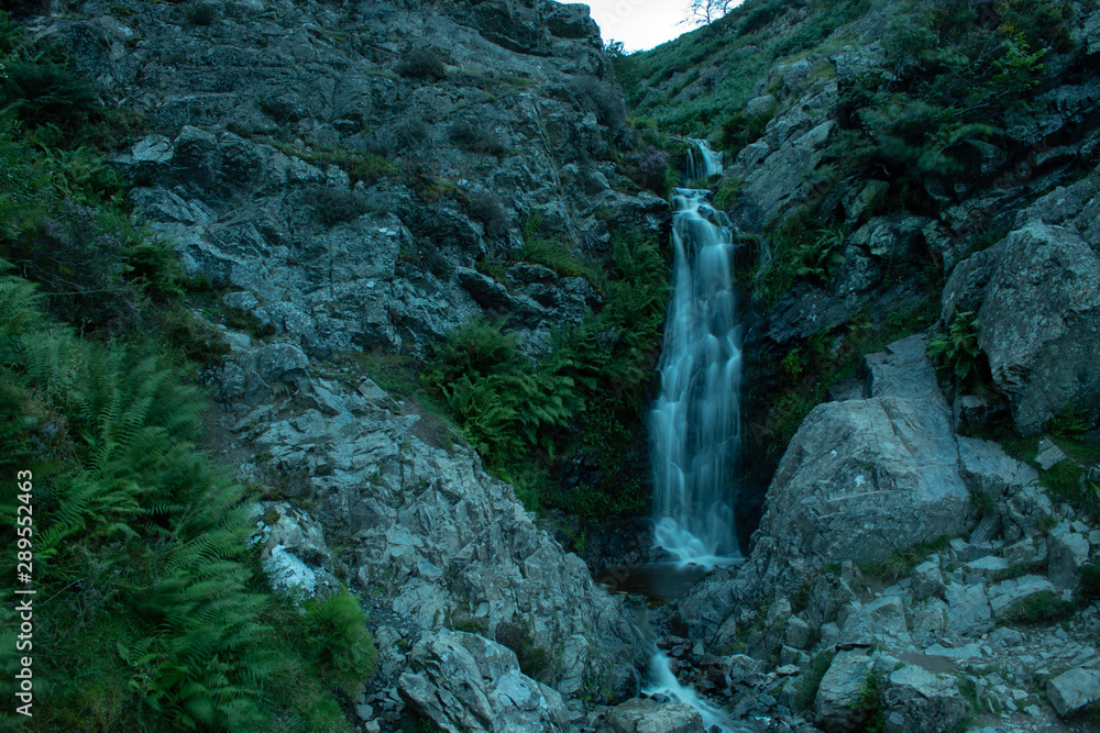 Waterfall in a rocky landscape