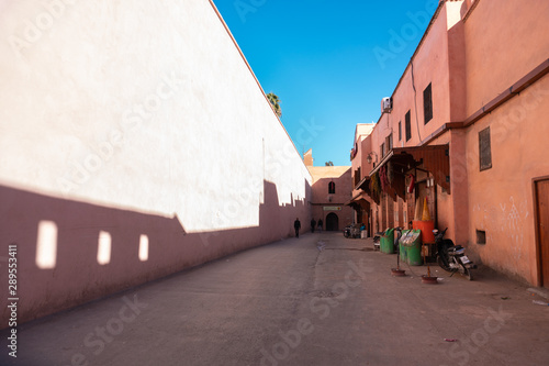 Small street in Marrakech's medina old town. In Marrakech the houses are traditionally pink. Morocco