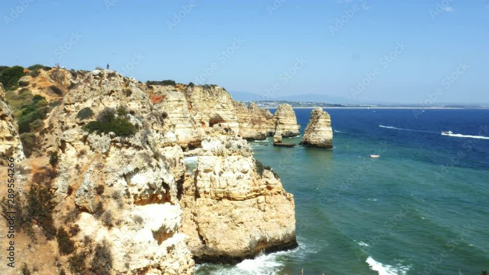 Reveal of sedimentary cliff rocks at Ponta da Piedade, Algarve region, Portugal Reveal of sedimentary cliff rocks at Ponta da Piedade, Algarve region, Portugal