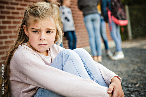 sad intimidation moment Elementary Age Bullying in Schoolyard