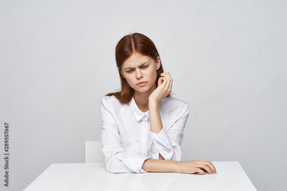 business woman sitting at desk with laptop business woman sitting at desk with laptop