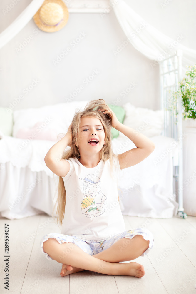 Healthcare concept. little girl scratching her blond hair from lice or allergies in kindergarten. hair loss problem and hair treatment concept. The child is itchy hair. fleas, encephalitis tick Healthcare concept. little girl scratching her blond hair from lice or allergies in kindergarten. hair loss problem and hair treatment concept. The child is itchy hair. fleas, encephalitis tick
