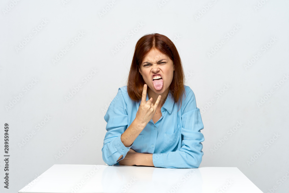 portrait of young woman sitting on floor portrait of young woman sitting on floor