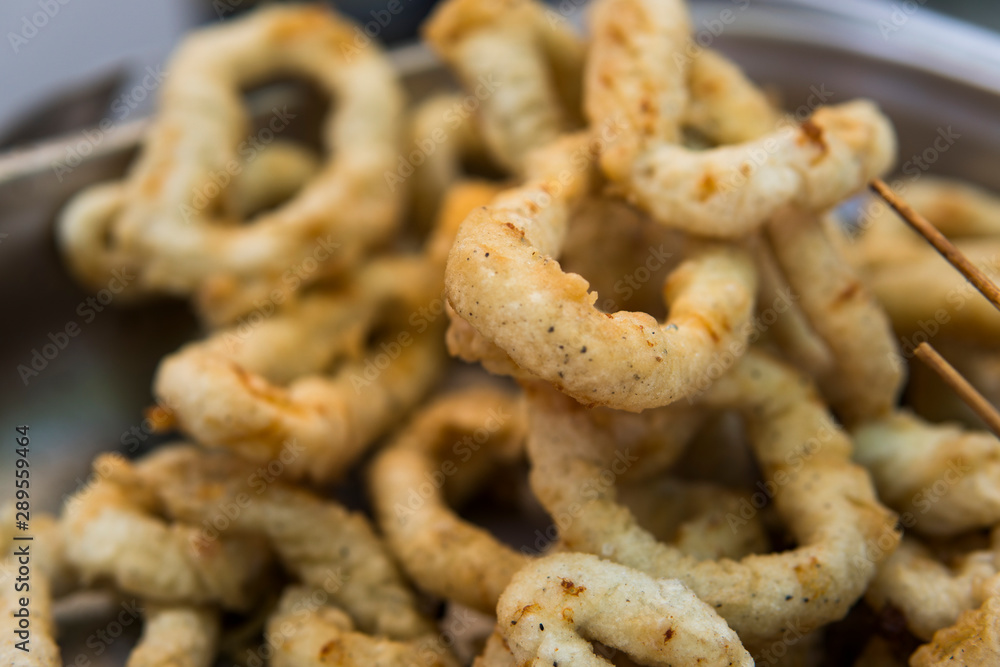 Delicious deep fried rings of squid close up. Delicious deep fried rings of squid close up.