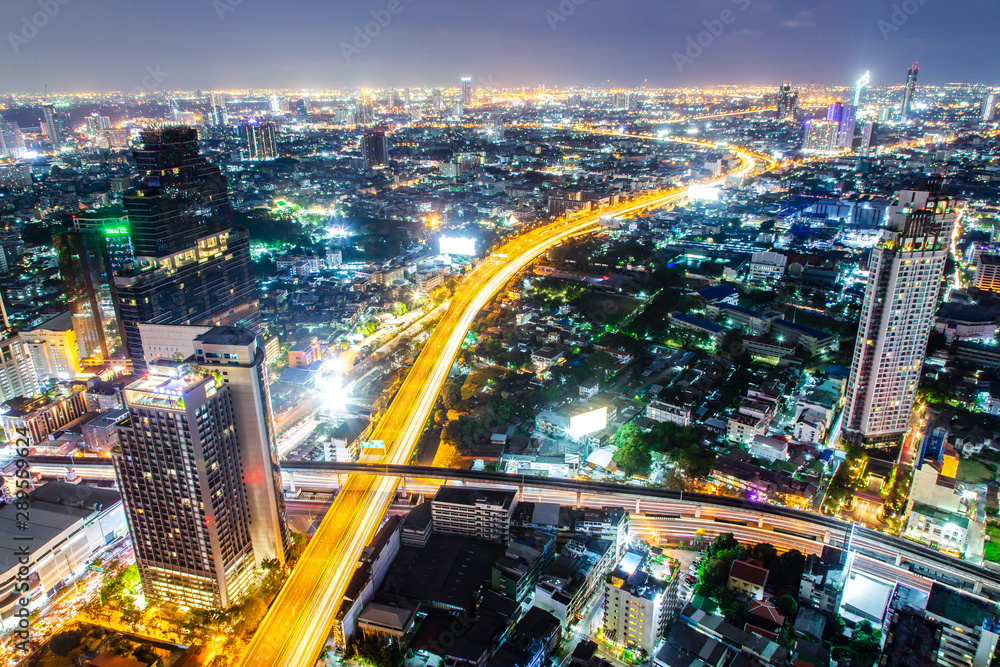 Fototapeta premium aerial night view of Bangkok City skyscrapers Thailand