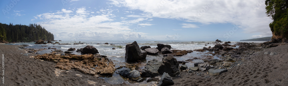 Beautiful Panoramic View of a rocky coast on the Juan de Fuca Trail during a sunny and cloudy summer day. Taken at Sombrio Beach, near Port Renfrew, Vancouver Island, BC, Canada. Beautiful Panoramic View of a rocky coast on the Juan de Fuca Trail during a sunny and cloudy summer day. Taken at Sombrio Beach, near Port Renfrew, Vancouver Island, BC, Canada.