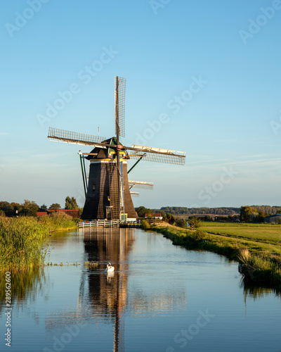 Landscape with Traditional Dutch Old Wooden windmills.