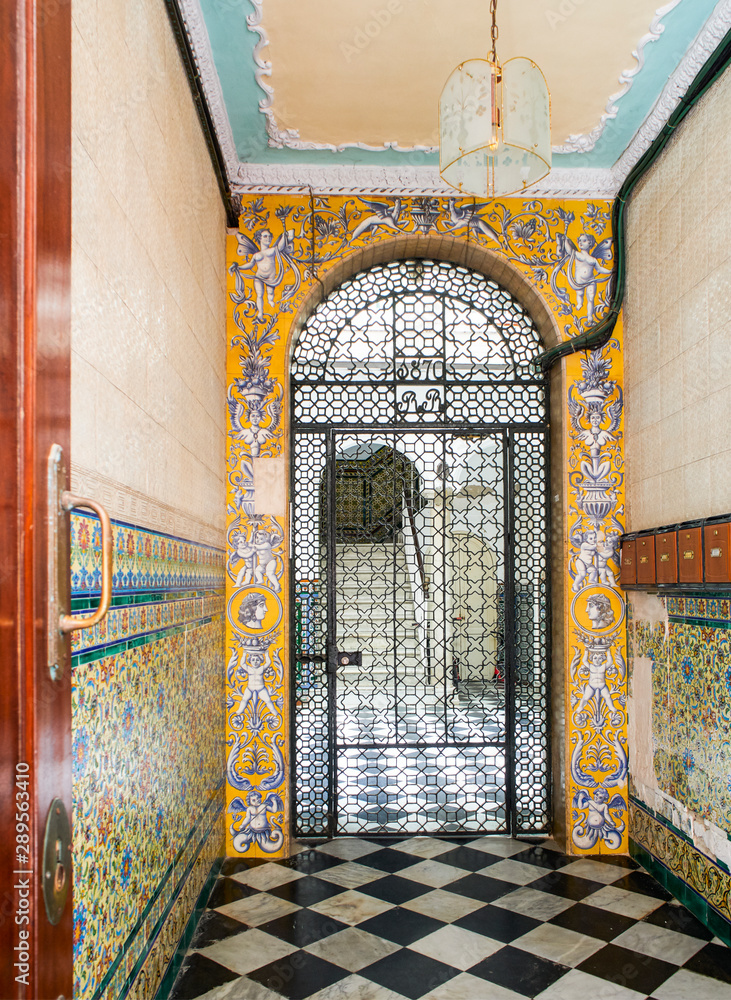 Typical antique tiled Andalusian entry to a Patio.