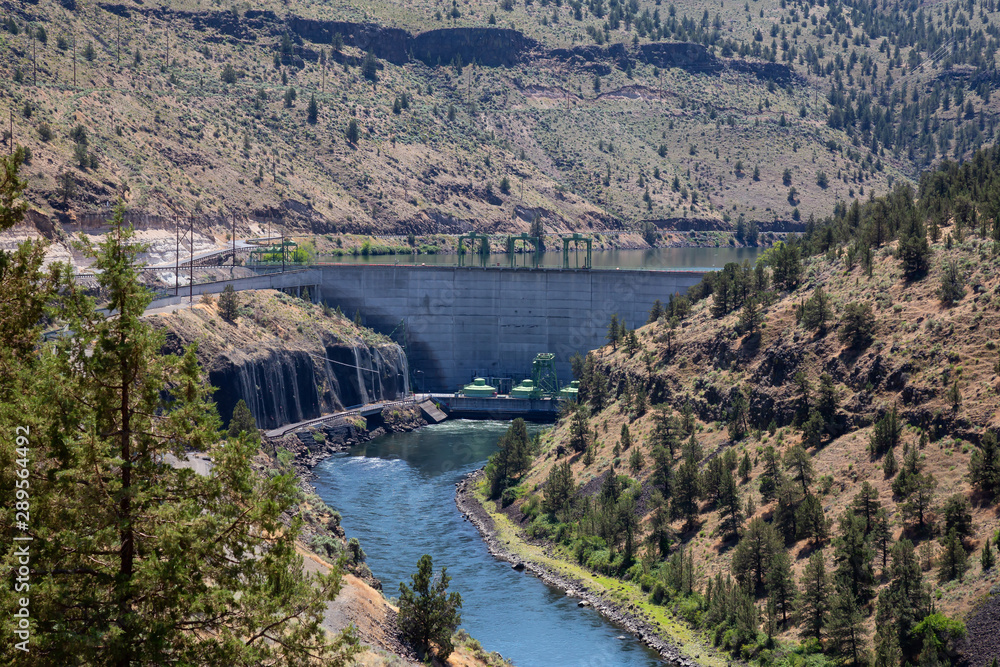 View of a Dam during a sunny summer day. Madras, Oregon, United States of America.