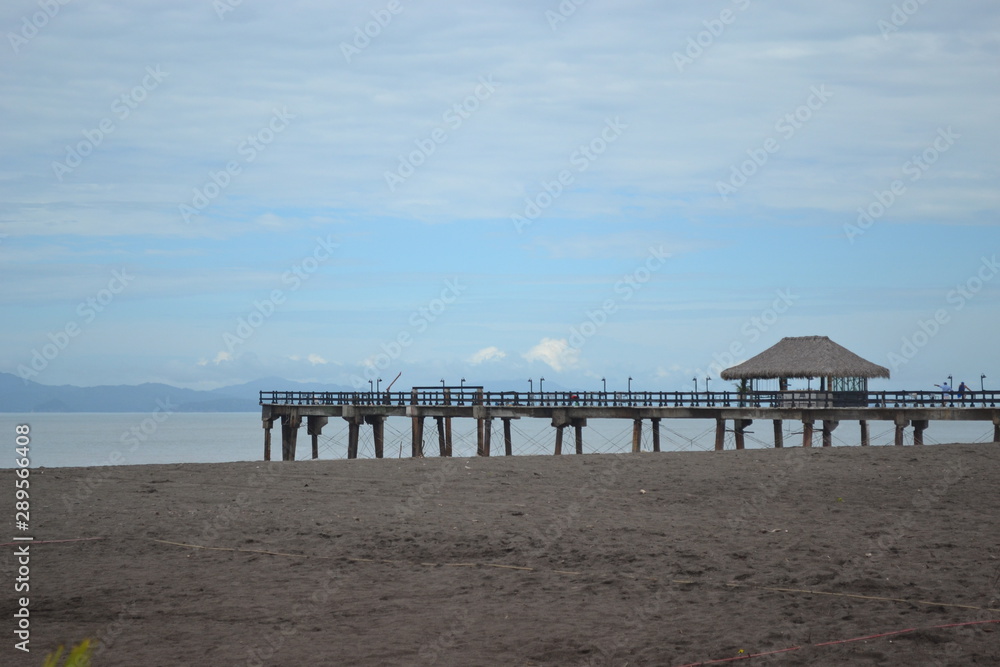 Beachfront pier; beach; waterfront; Costa Rica