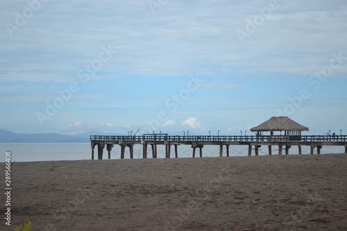 Beachfront pier; beach; waterfront; Costa Rica