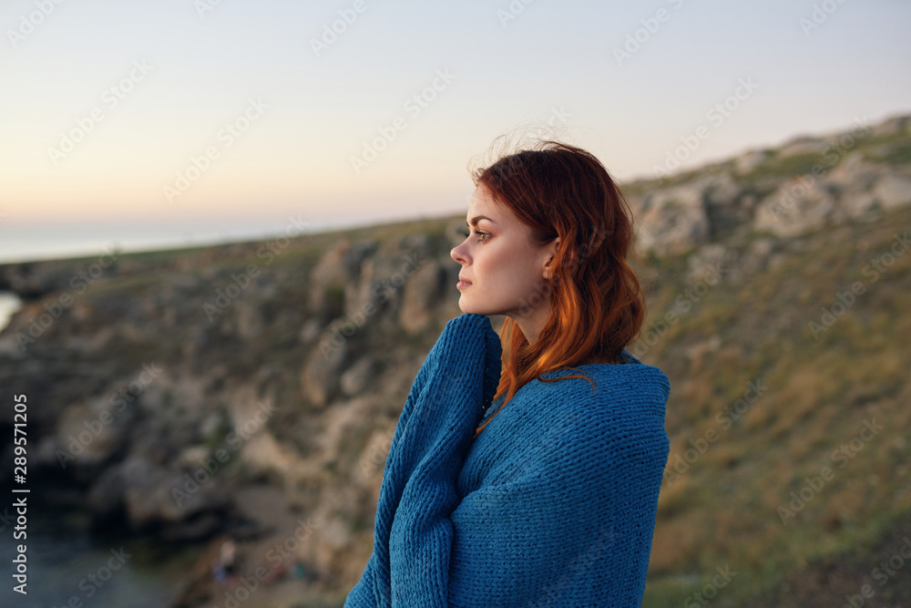 portrait of young woman on the background of blue sky portrait of young woman on the background of blue sky