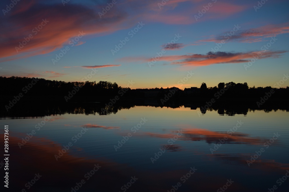 sunset over the lake in utena lithuania